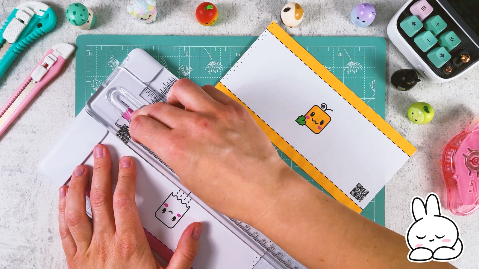 Cutting a pumpkin strip from the printed sheet with a paper trimmer