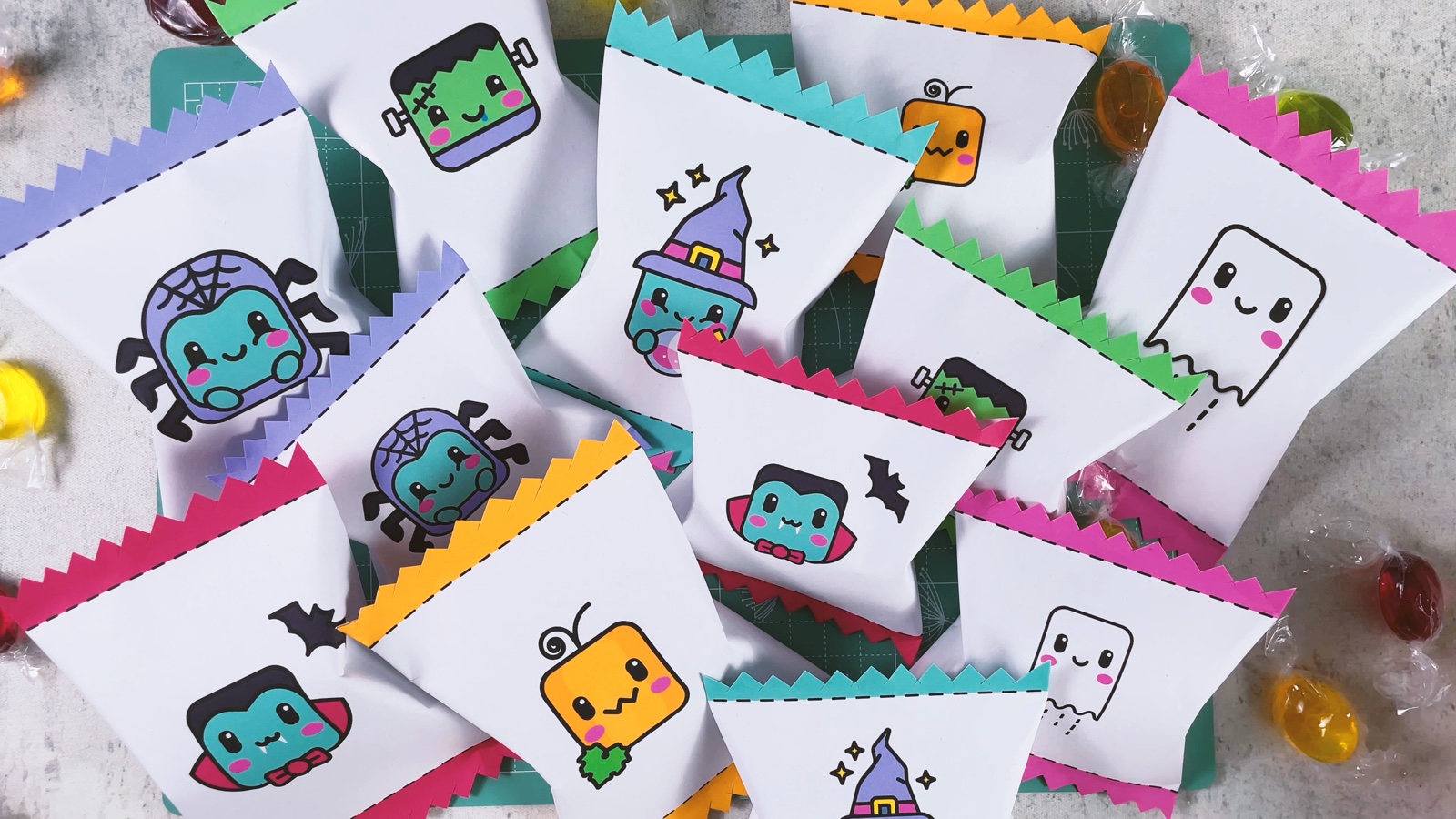 A whole collection of finished candy bags: spiders, witches, ghosts, pumpkins, vampires and Frankenstein