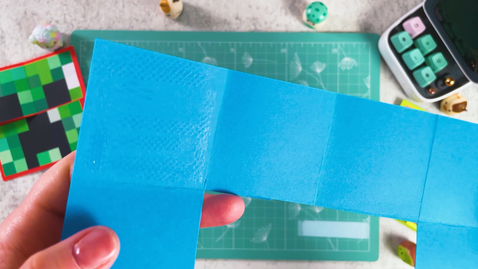 Glue spread on the squares of the blue frame