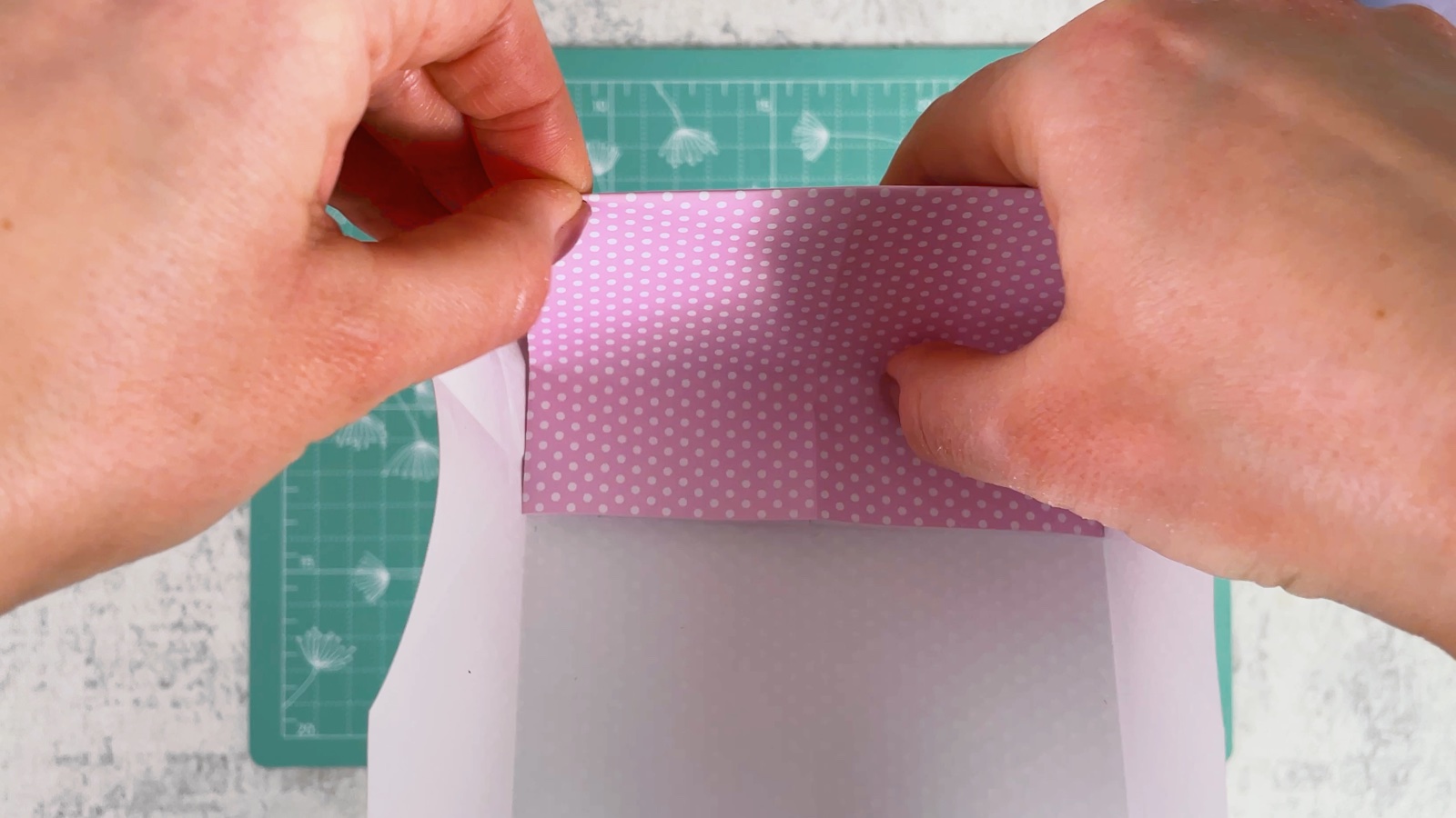 Folding up the bottom of the paper tube