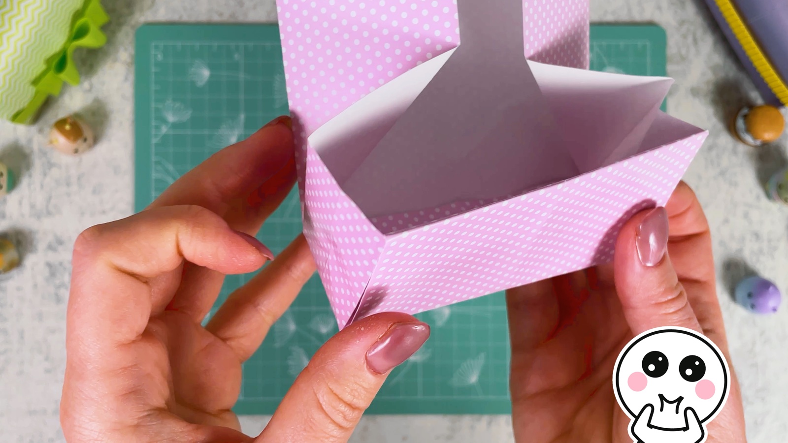 Pushing the side corners of the box inwards