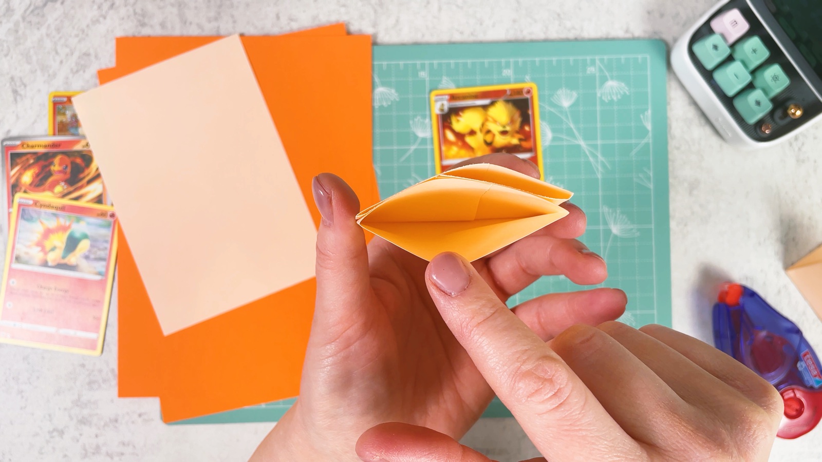Opening the top edge of the paper pocket