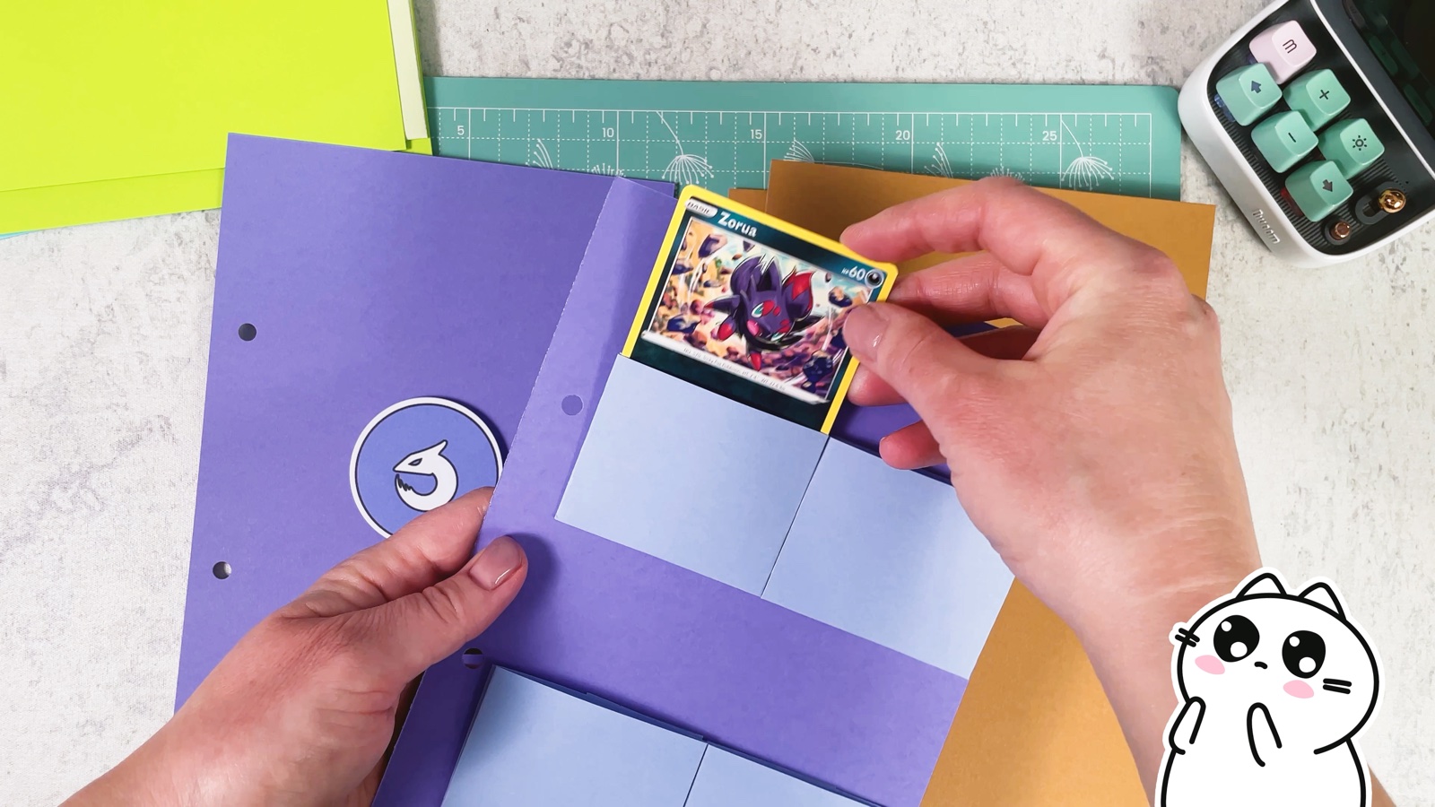 Putting a Psychic Pokémon card into a pocket on a purple page