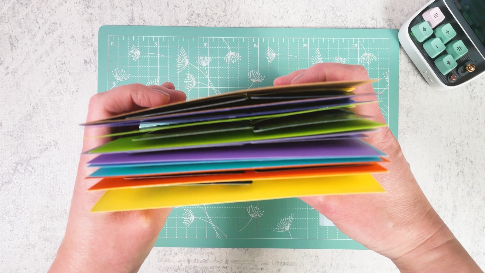 A fan of finished pages in many colours