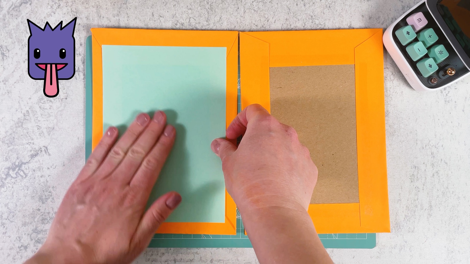 Pressing a sheet of mint paper inside the cover