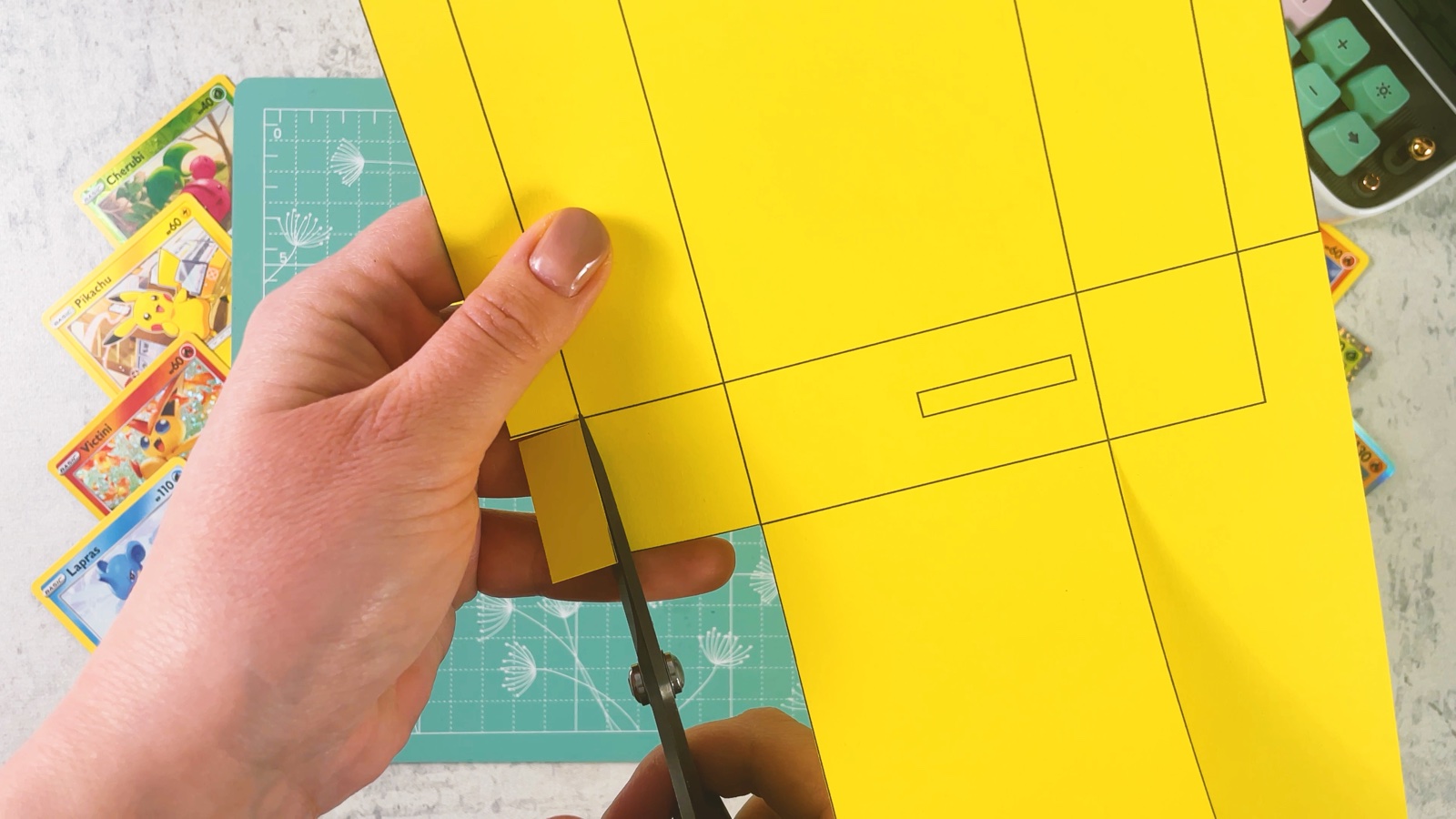 Cutting the yellow base piece out of the printed sheet