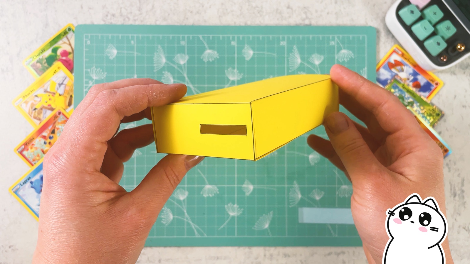 The finished yellow base box with the coin slot on the front