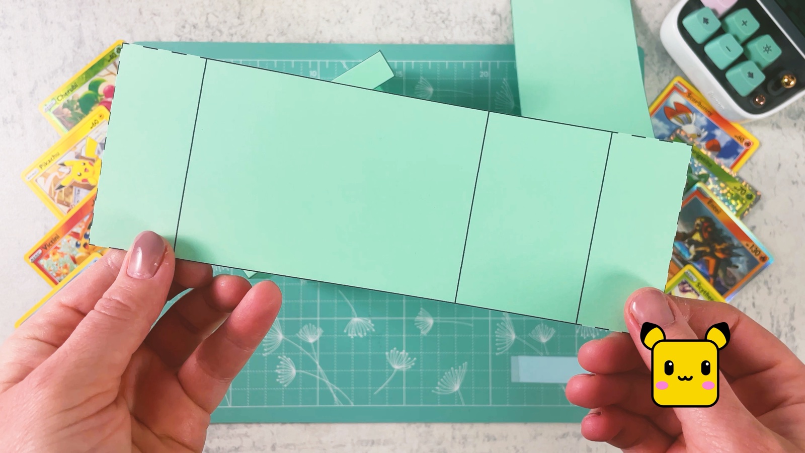The mint card tray piece from page 3, with dashed edges
