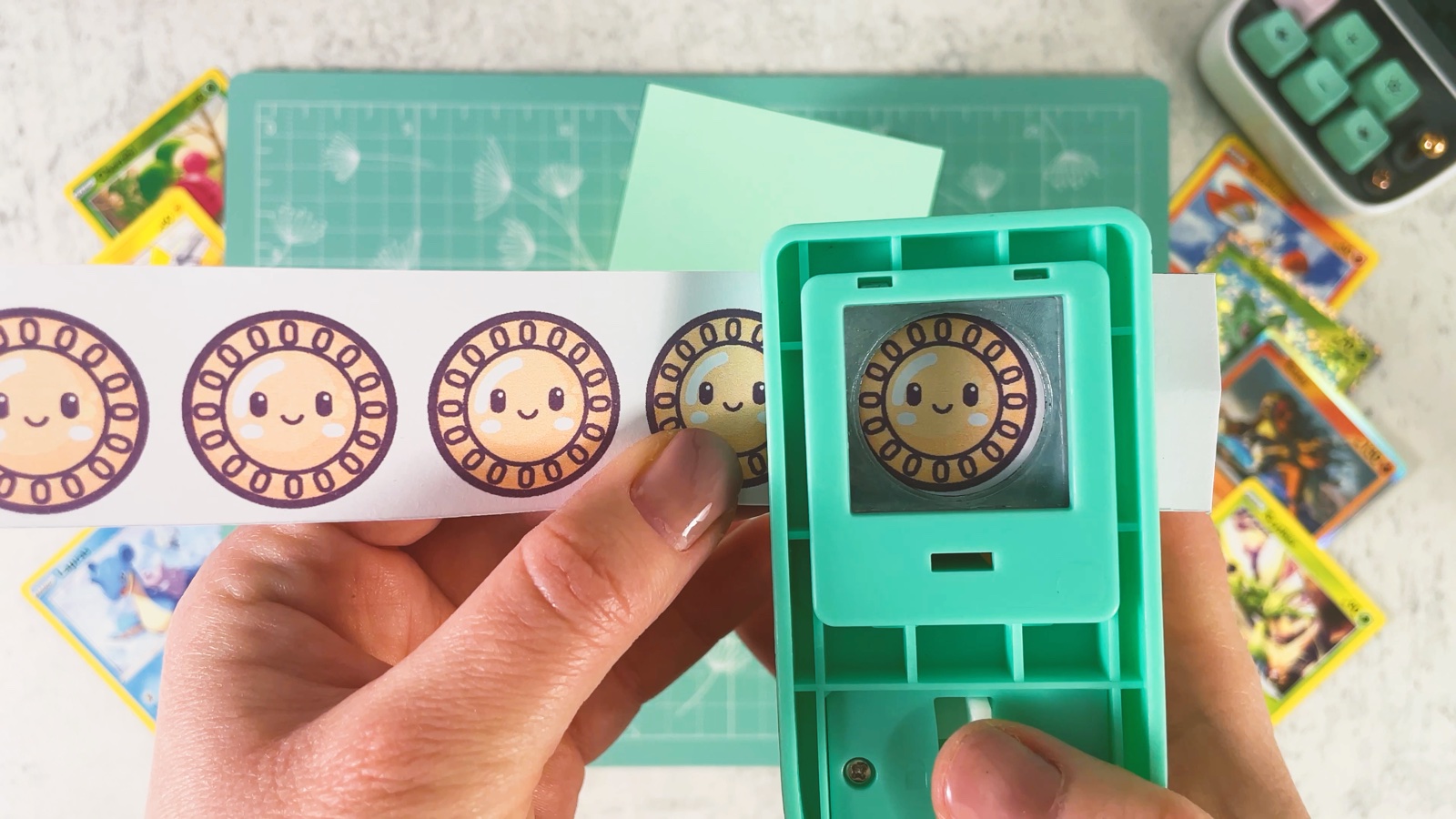 Punching out a paper coin with a circle punch