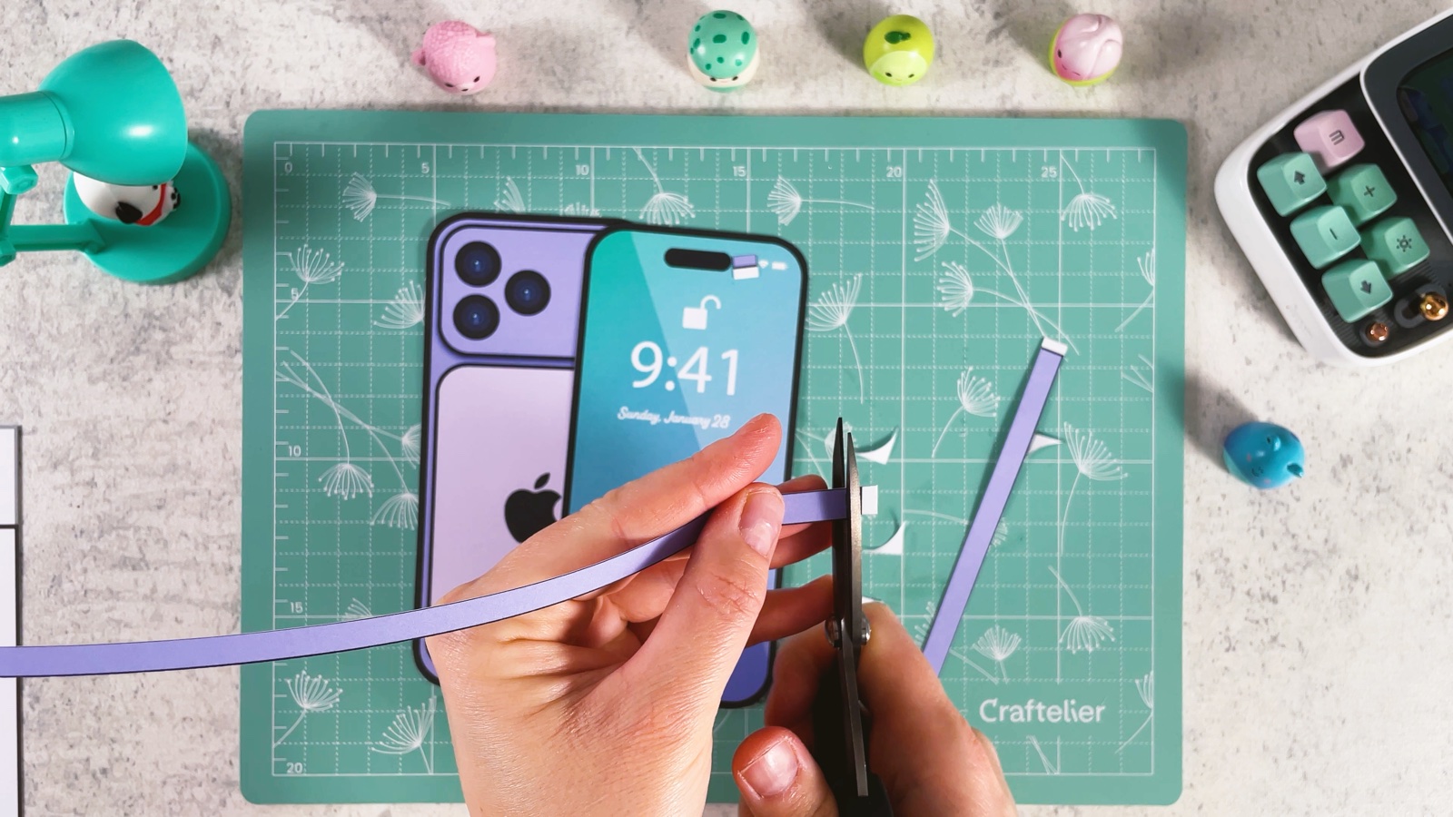 Cutting a long purple side strip off the page