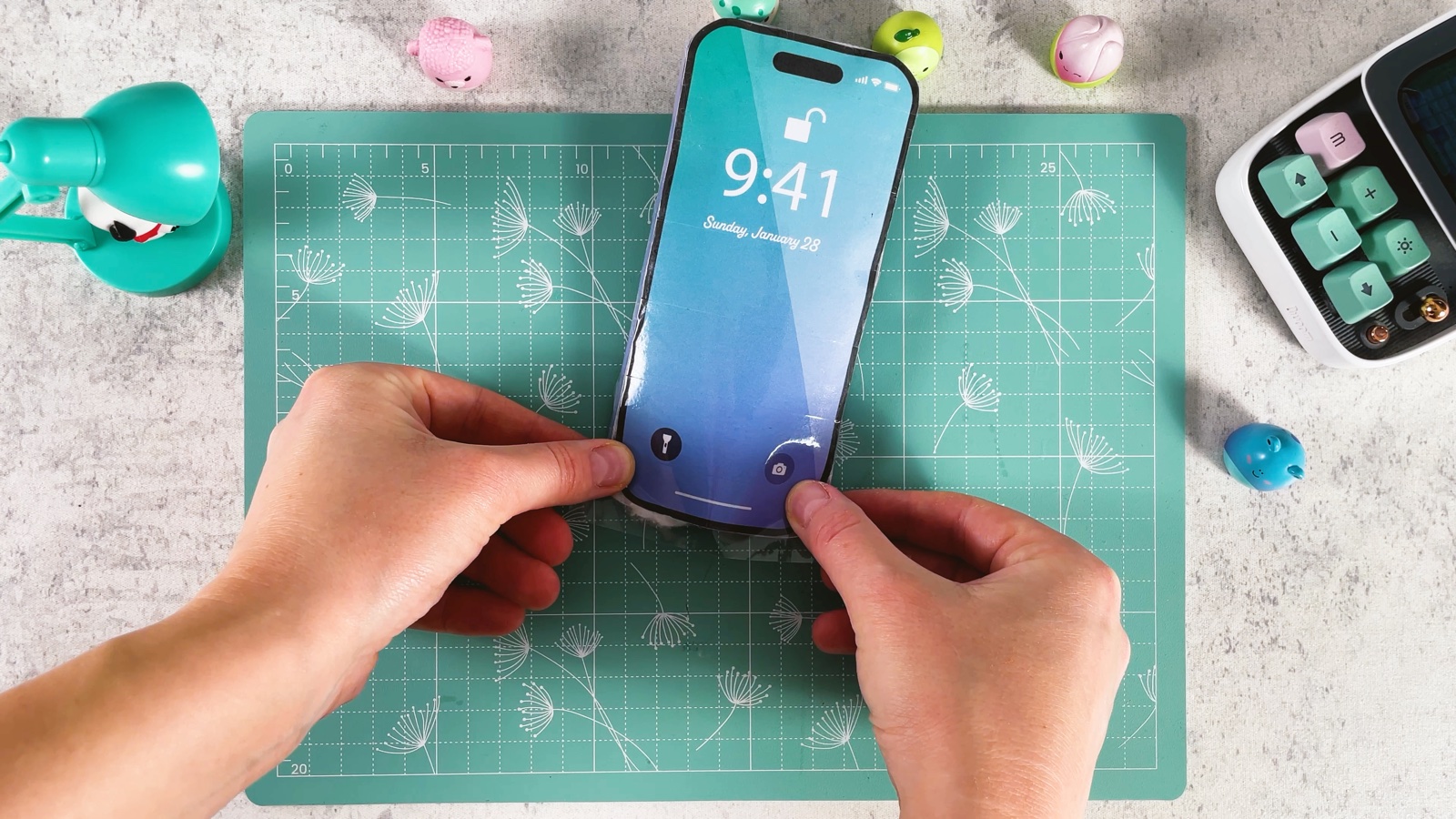 Taping the bottom edge of the screen to the side strip to close the phone