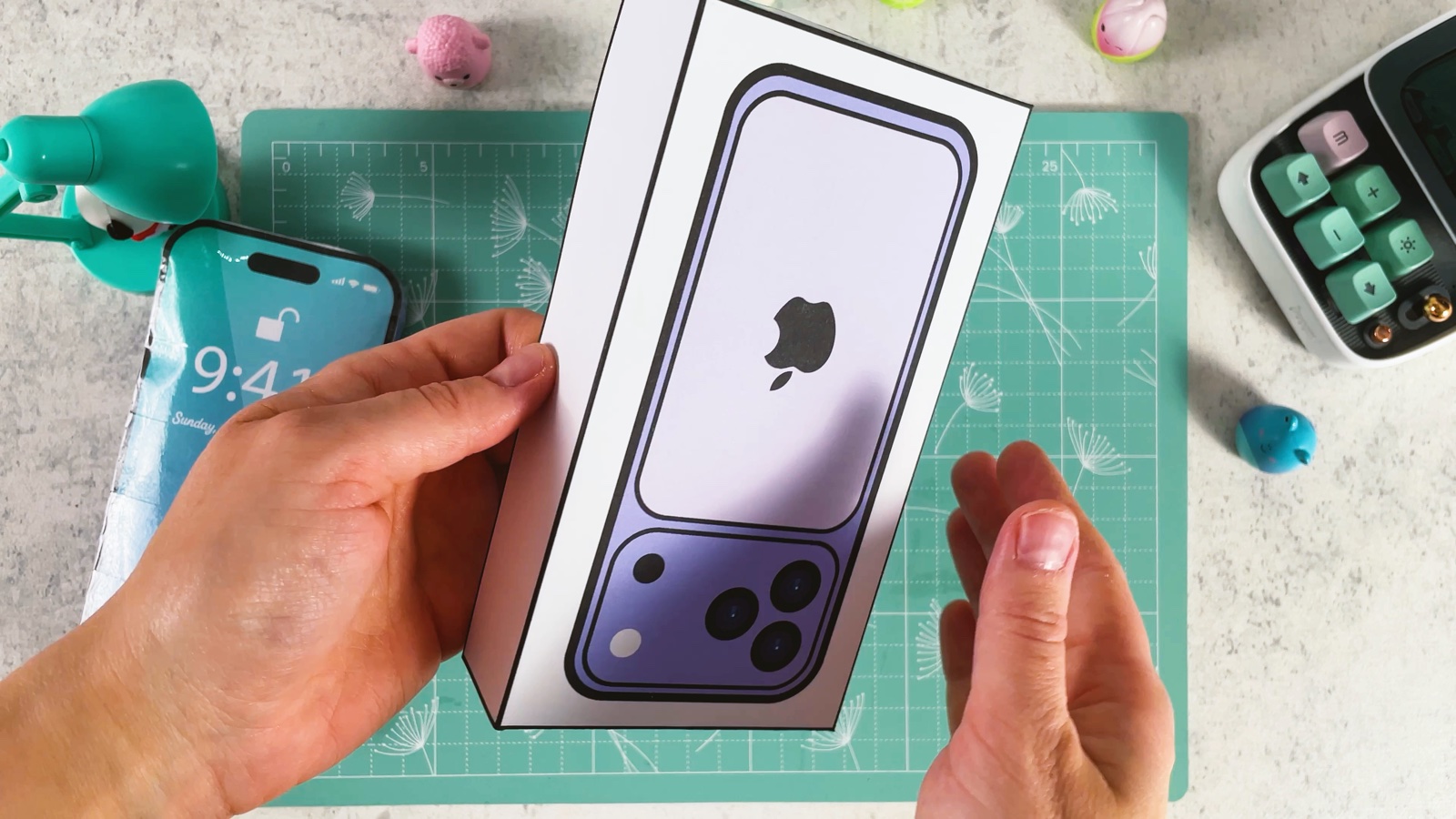 The finished box lid with the purple iPhone picture on top