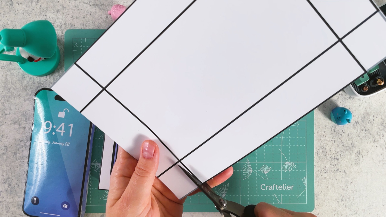 Cutting into the corner of the plain box bottom page along the black line